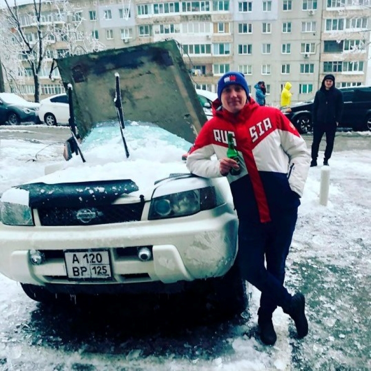 Alexander of Vladivostck Russia next to his car
