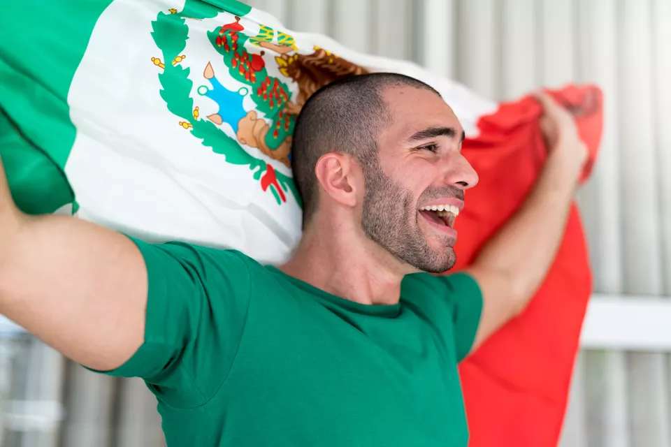 Patriotism and celebration of a Mexican young fan